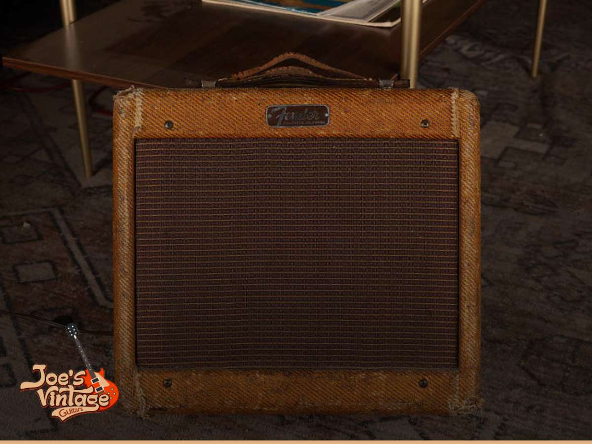 Vintage Fender amplifier with worn tweed covering, perfect for determining the Fender amplifier's age